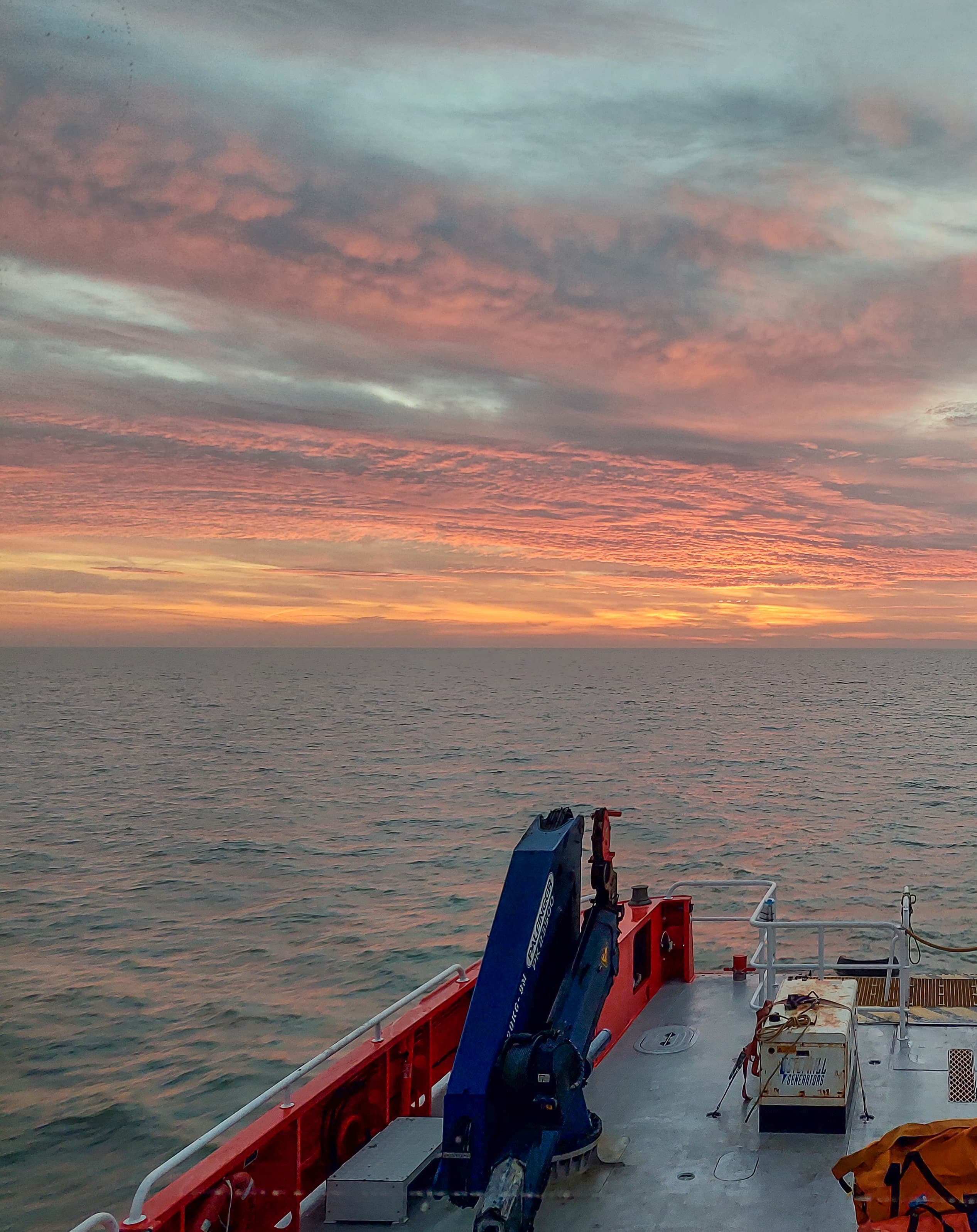 Maritime operations at sunset