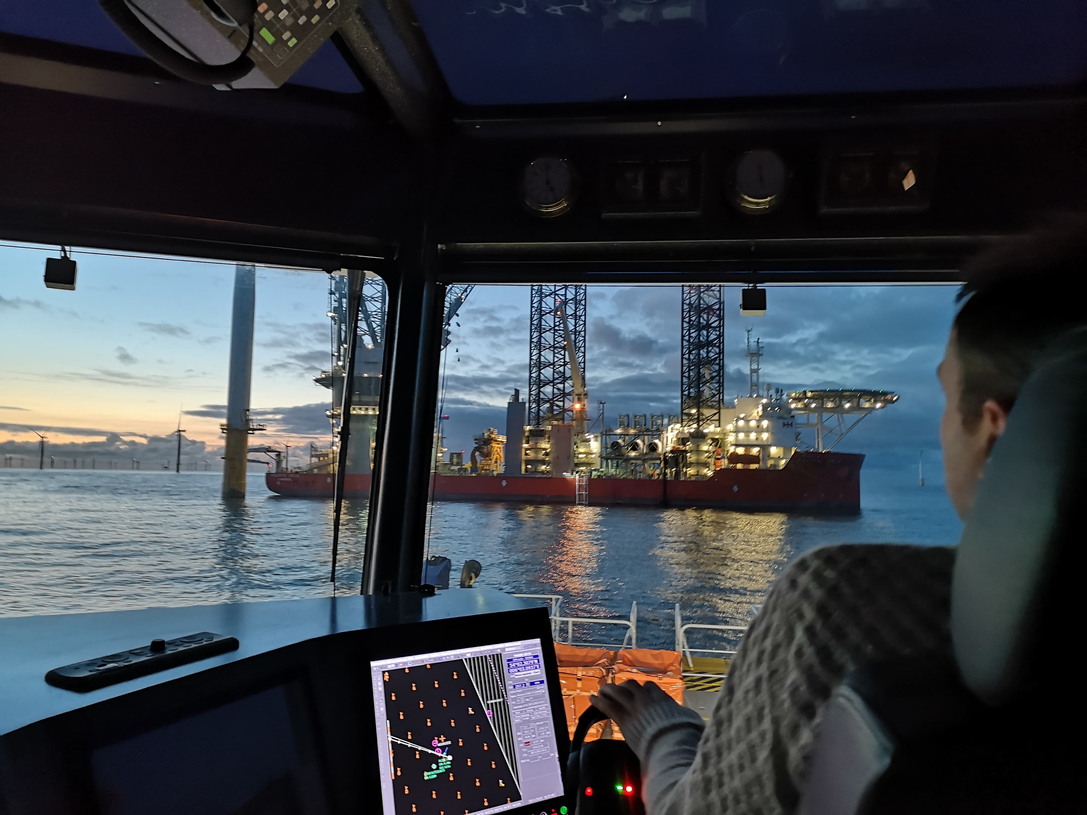 Maritime professional on bridge during offshore operations